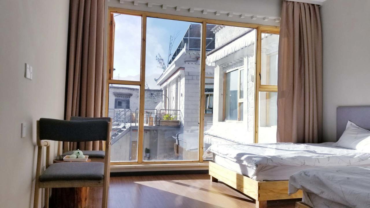 Fengma Feiyang Hostel Lhasa Bagian luar foto