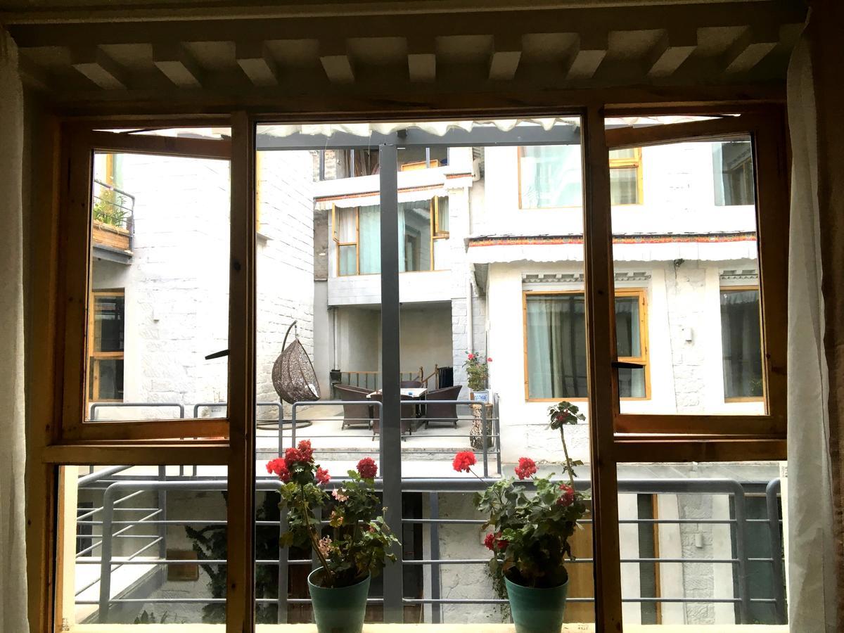 Fengma Feiyang Hostel Lhasa Bagian luar foto